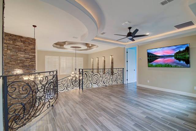 Great room with ironwork stair rail, McAllen TX