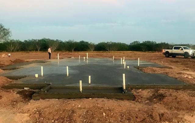 Cleared homesite with string lines